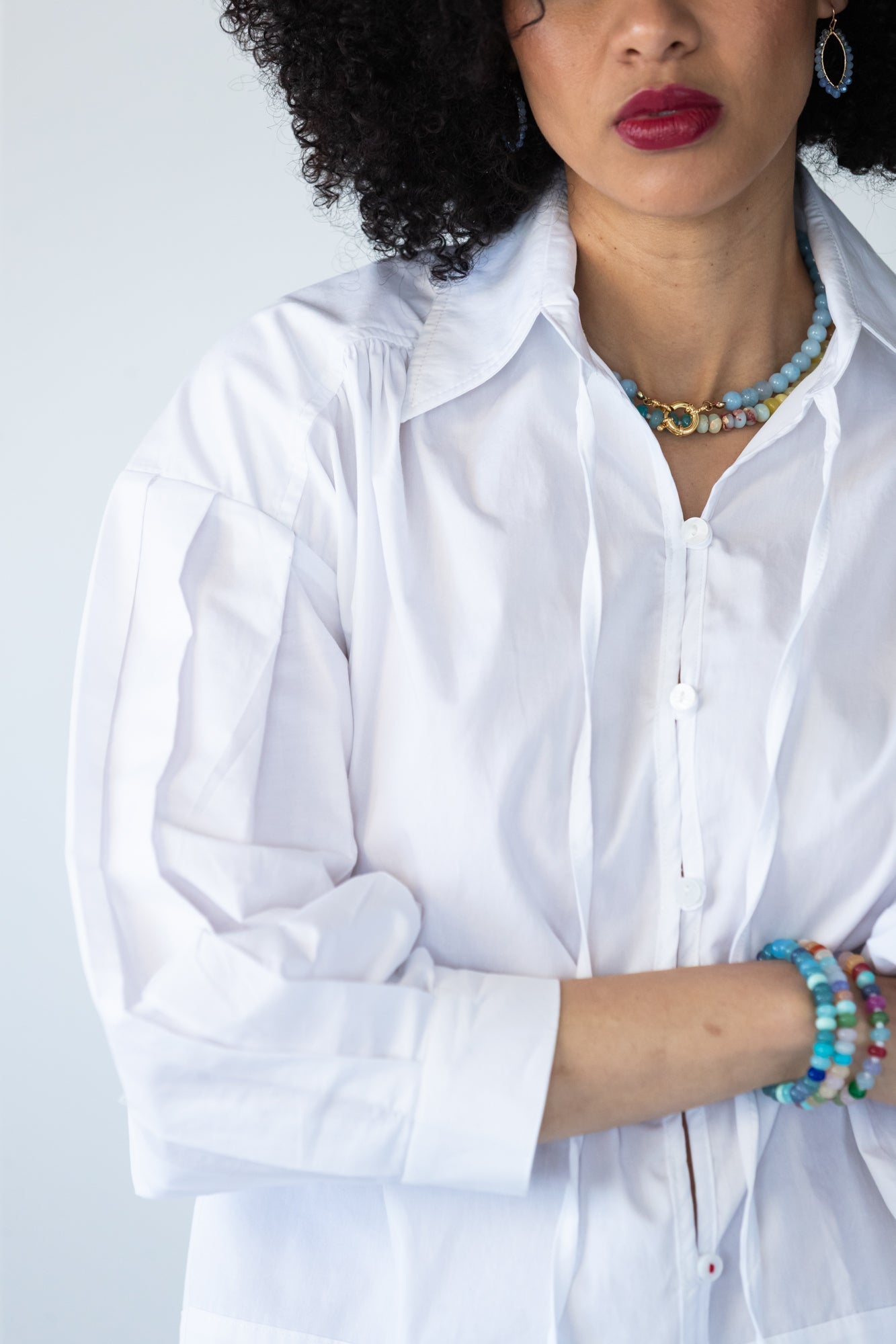 Blake white poplin shirt, close up of neckline with hands at collar