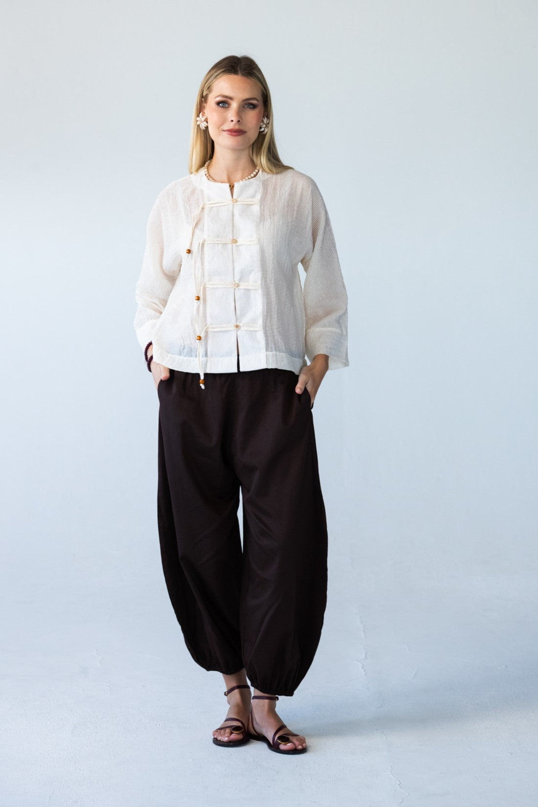 Amelia milk relaxed shirt, front view full length styled with Stella Balloon Pants in Chocolate