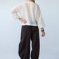 Amelia milk relaxed shirt, back view styled with Stella Balloon Pants in Chocolate