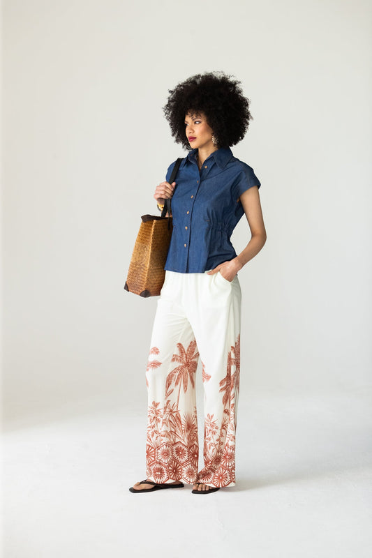 Sydney palm border wide leg pants, front view with hand in pocket