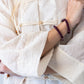 Amelia milk relaxed shirt, close up of batwing sleeve with arms crossed