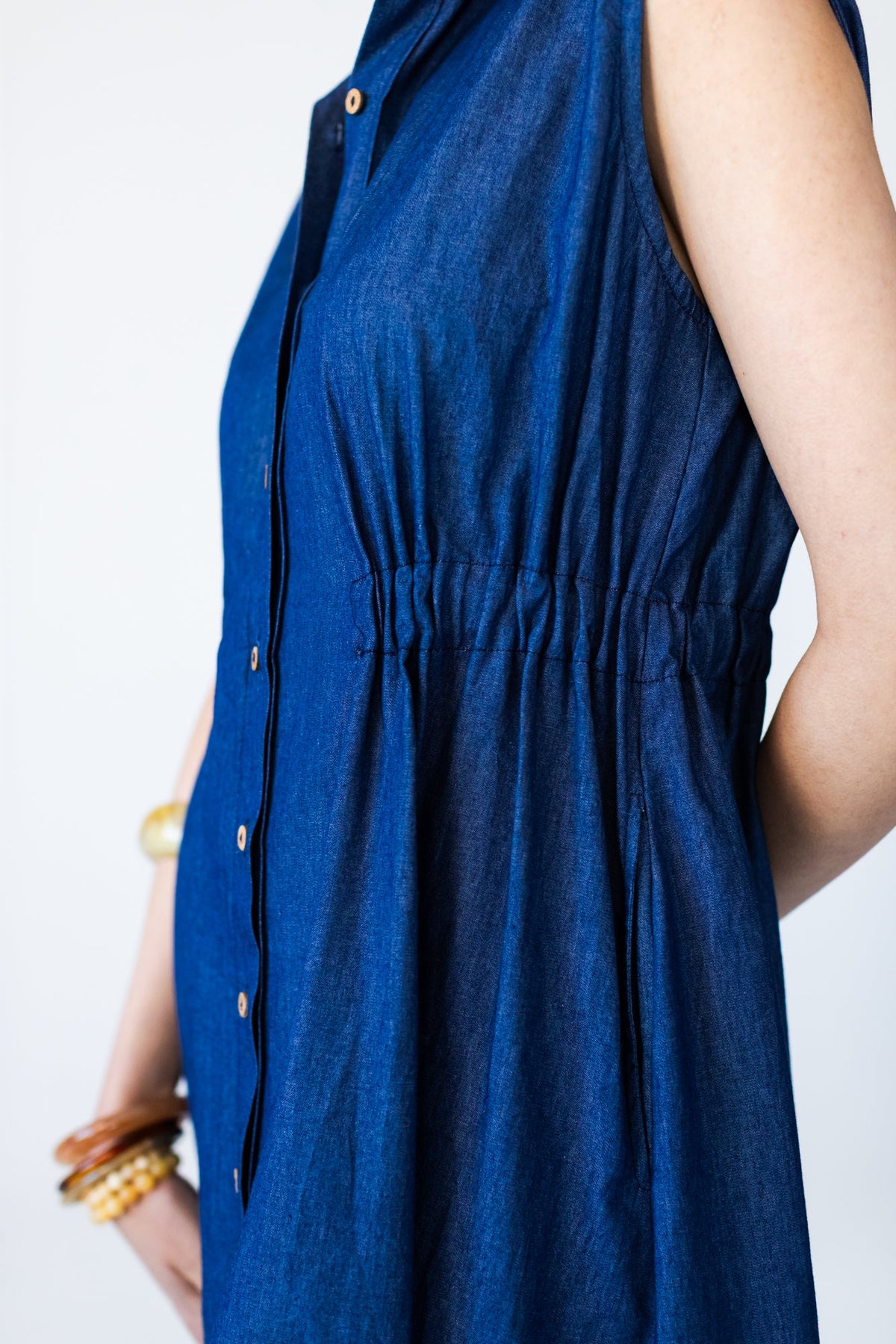 Sutton denim shirt-dress, close-up of elasticated waist and side pocket
