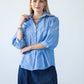 Claire frill stripe shirt, front view with arms crossed