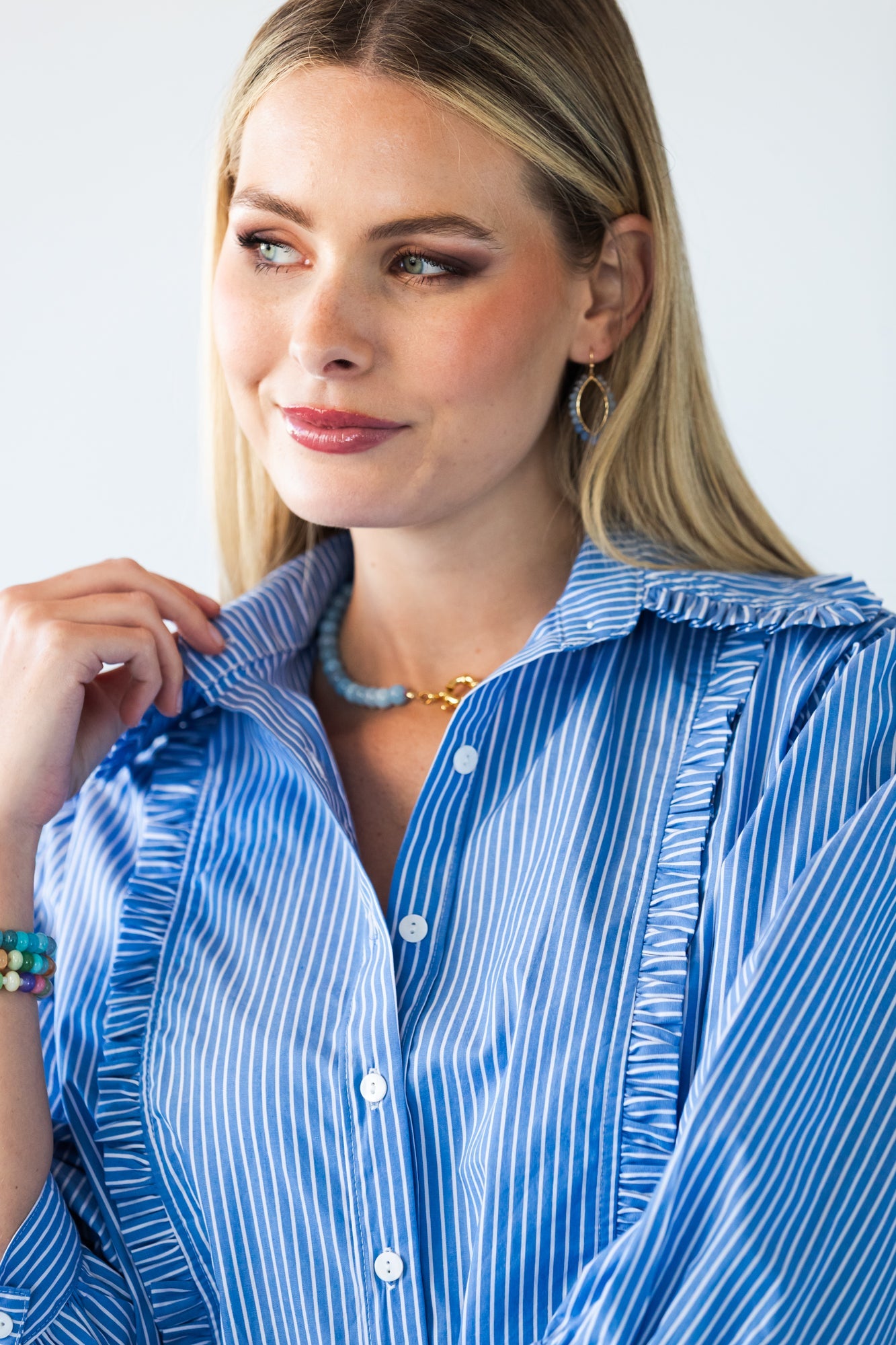 Claire frill stripe shirt, close up of collar with hand at neckline