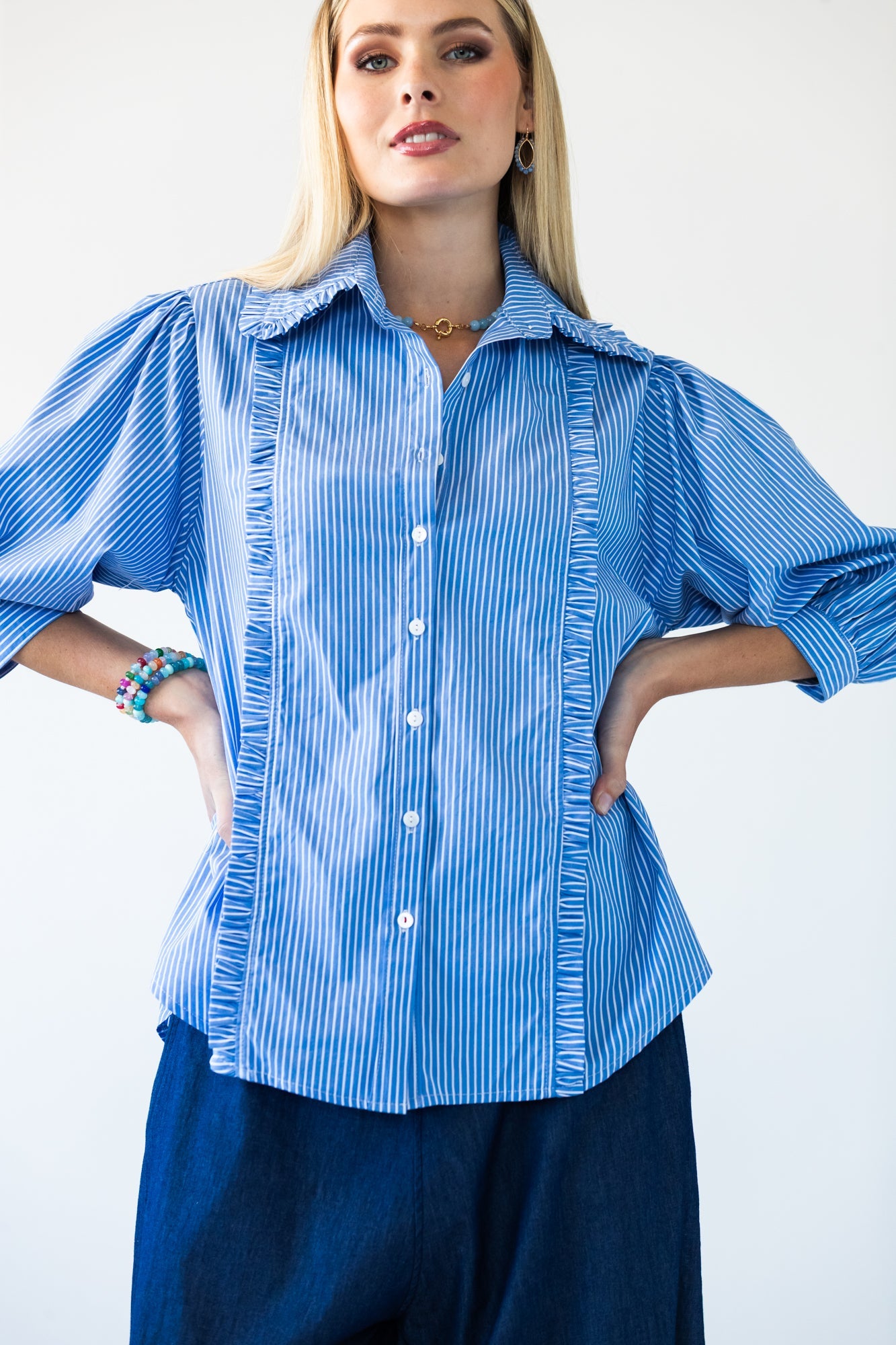 Claire frill stripe shirt, front view with hands on hips