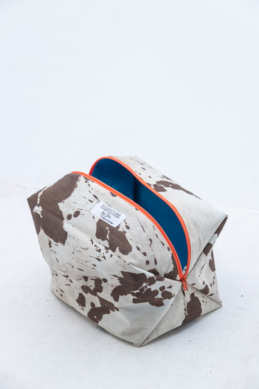 The Intentional Toiletry Bag - Cow Print