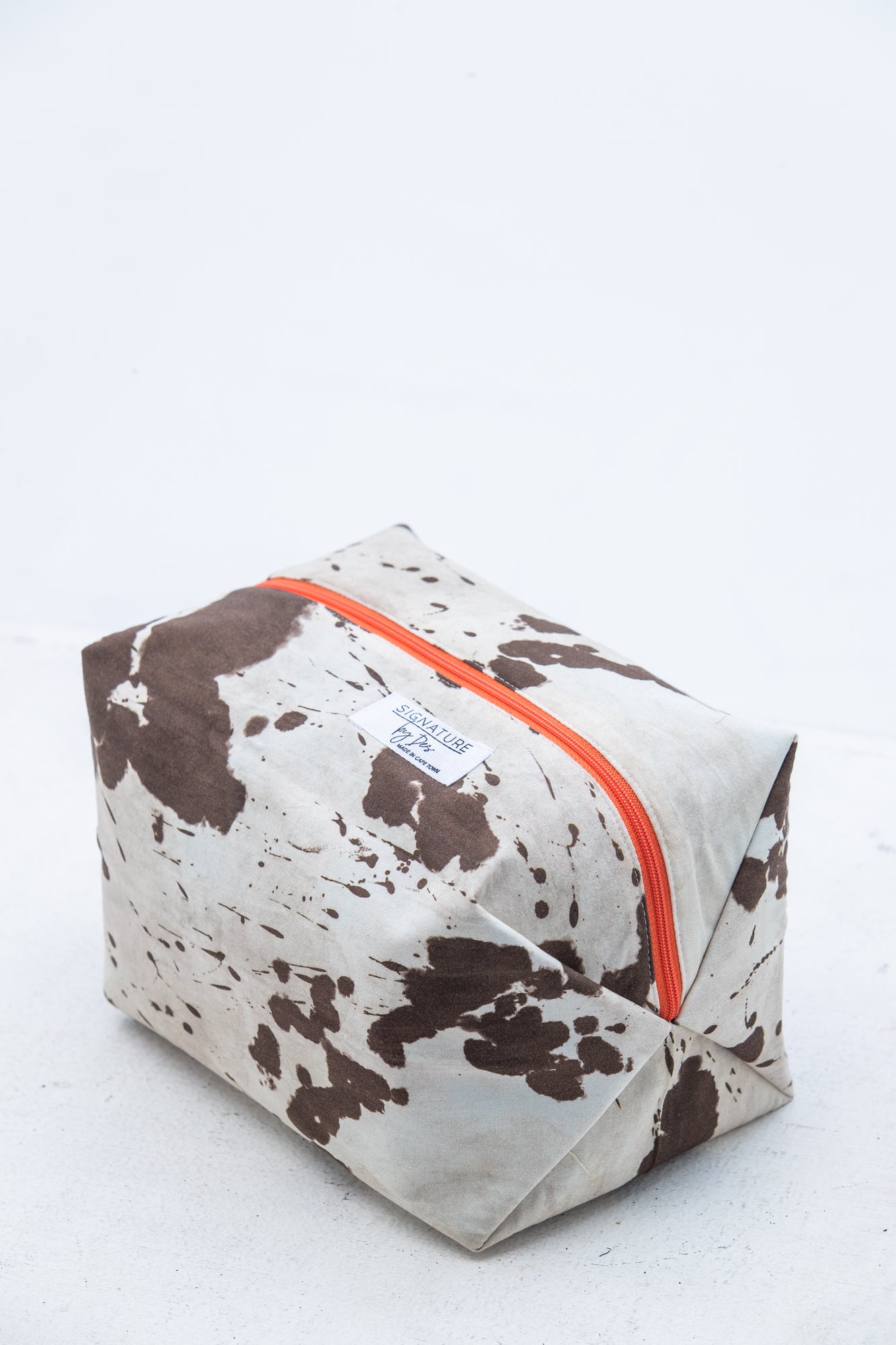 The Intentional Toiletry Bag - Cow Print
