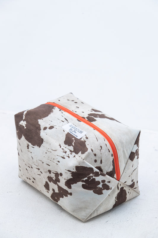 The Intentional Toiletry Bag - Cow Print
