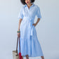 Frankie blue check shirt dress, front view walking with tote bag