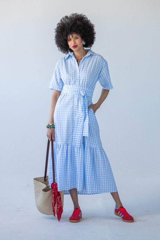 Frankie blue check shirt dress, front view walking with tote bag